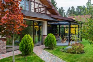 Seasonal garden of modern glass building